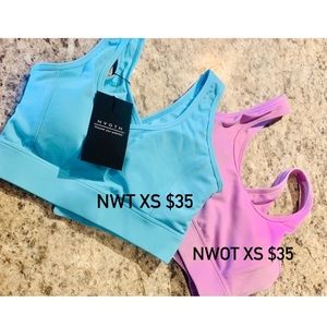 Two XS NVGTN sports bras